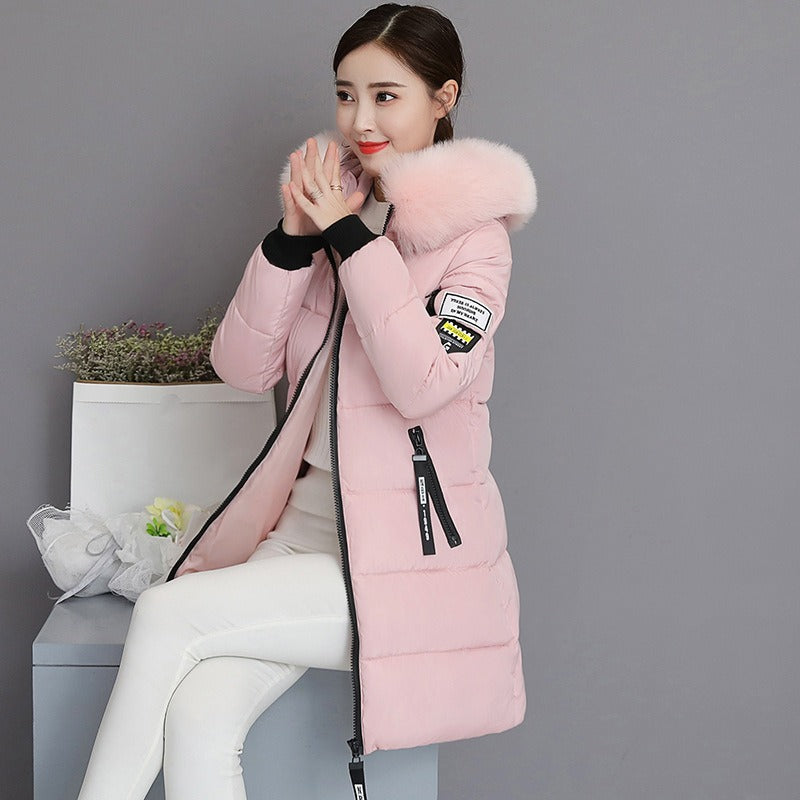 Warm women's long winter parka coat, hooded for ultimate protection from cold, suitable for stylish everyday wear.