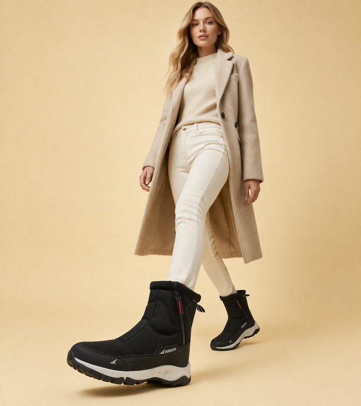 Female outdoor footwear: warm, non-slip snow boots with side zip for easy wear in winter conditions.