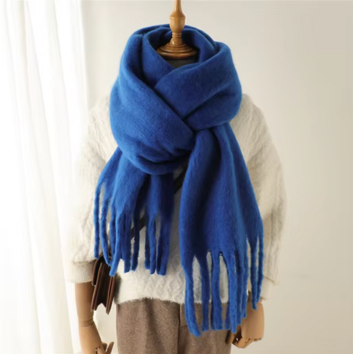 Cozy wrap women's winter scarf with stylish fringes, perfect for warmth & fashion.