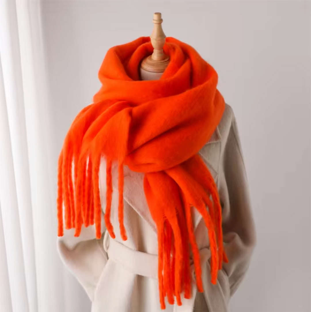 Luxurious women's warm winter scarf, pashmina-style with soft texture & delicate fringes.