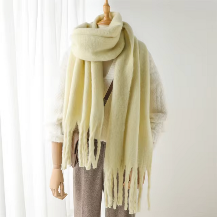 High-quality women's warm winter scarf, durable & stylish with cozy feel & elegant fringes.
