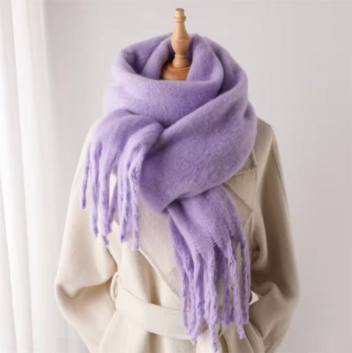 Warm & stylish women's scarf for winter, pashmina-style with elegant fringes, a fashion accessory.
