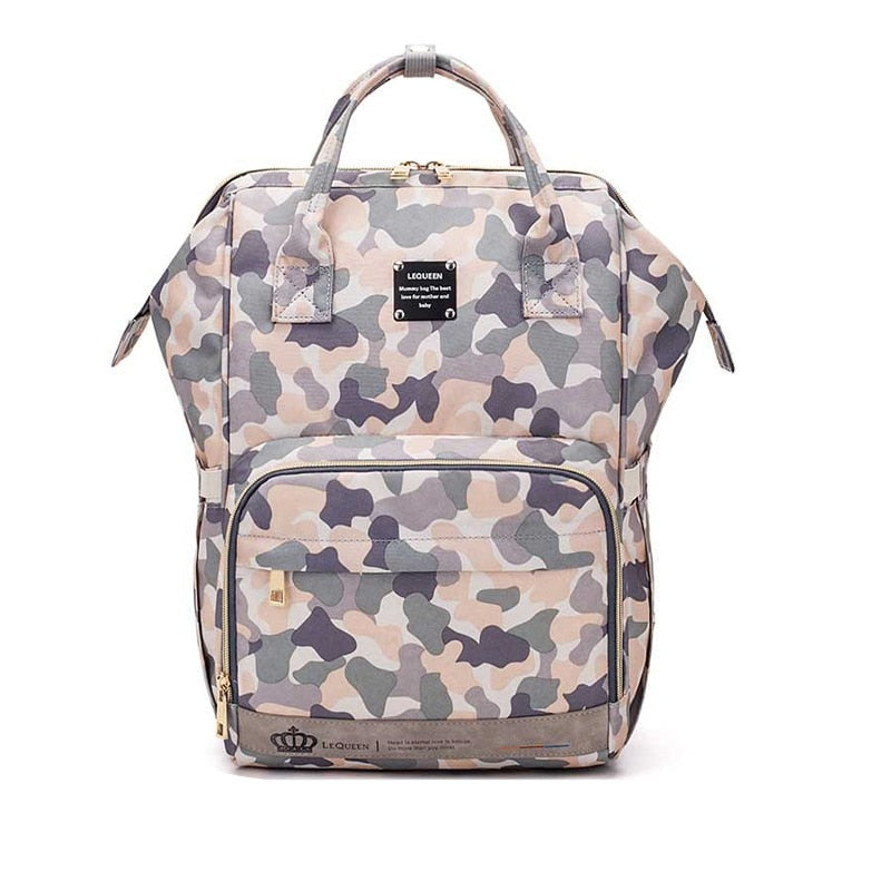 Stylish mom bag: waterproof diaper backpack, large capacity travel nappy bag for all baby gear.