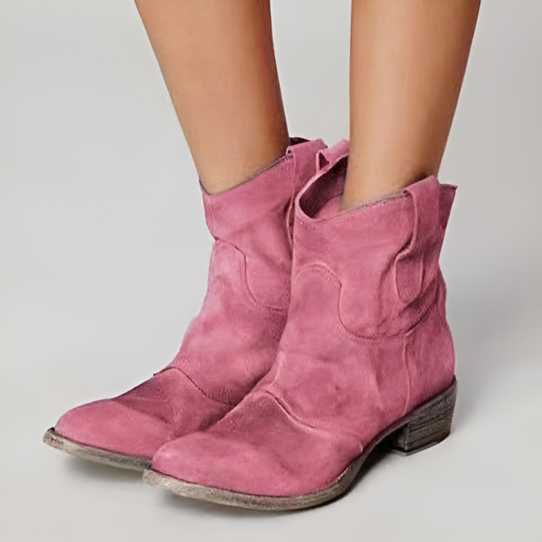 Chic women's Western ankle boots with functional pull tabs, a must-have for modern footwear.