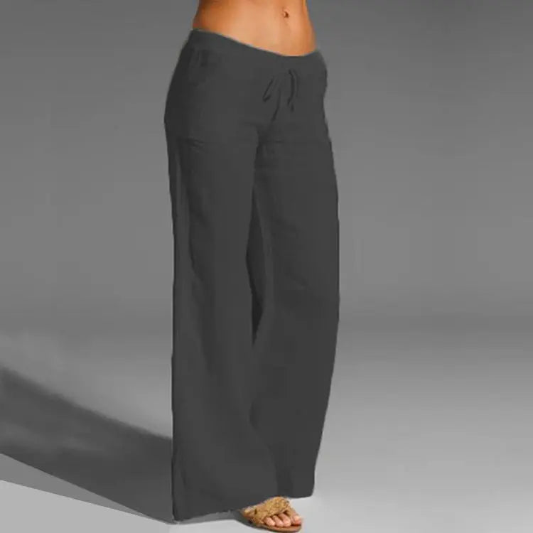 Stylish women's loose linen blend summer pants for a casual look, perfect for travel, beach or everyday wear.