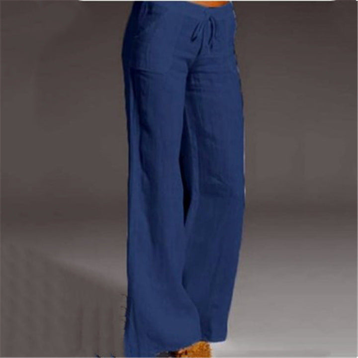 Comfortable women's linen blend trousers with elastic waist, loose fit, ideal for summer, travel, and casual occasions.
