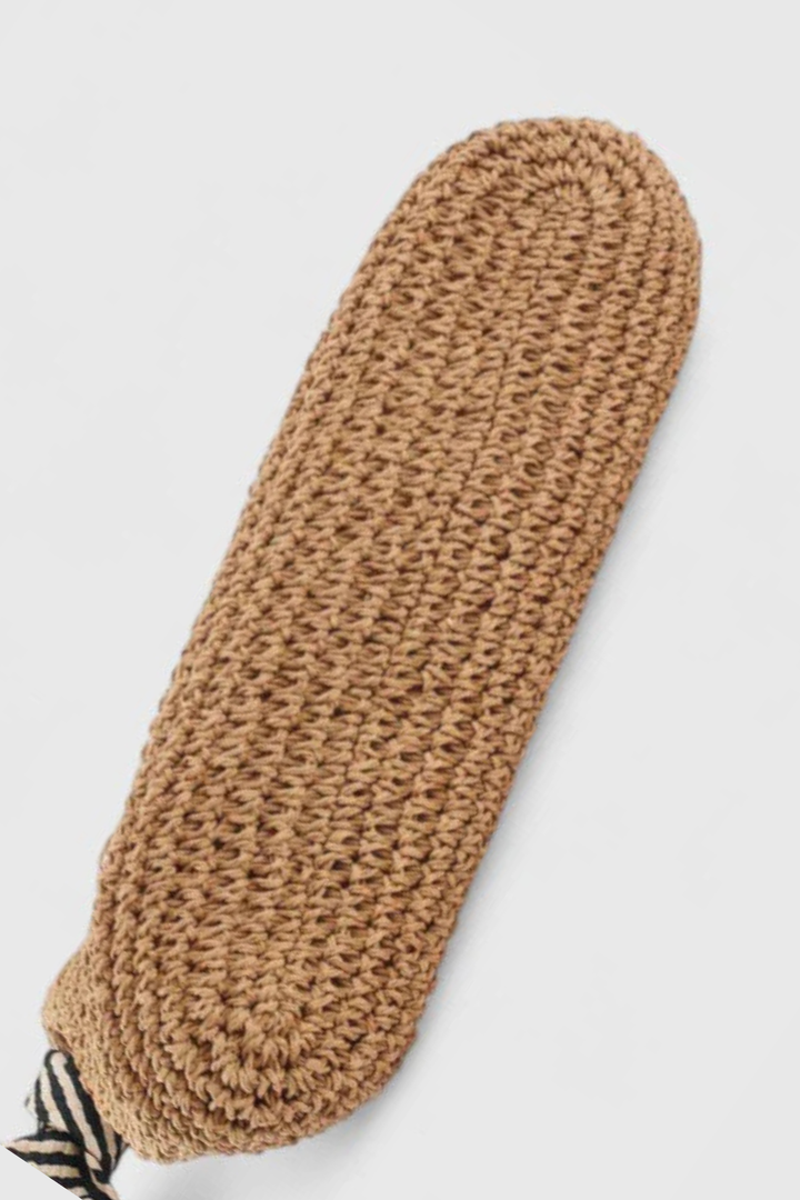 Handcrafted woven straw tote bag for women, designed with durable, contrasting shoulder straps.