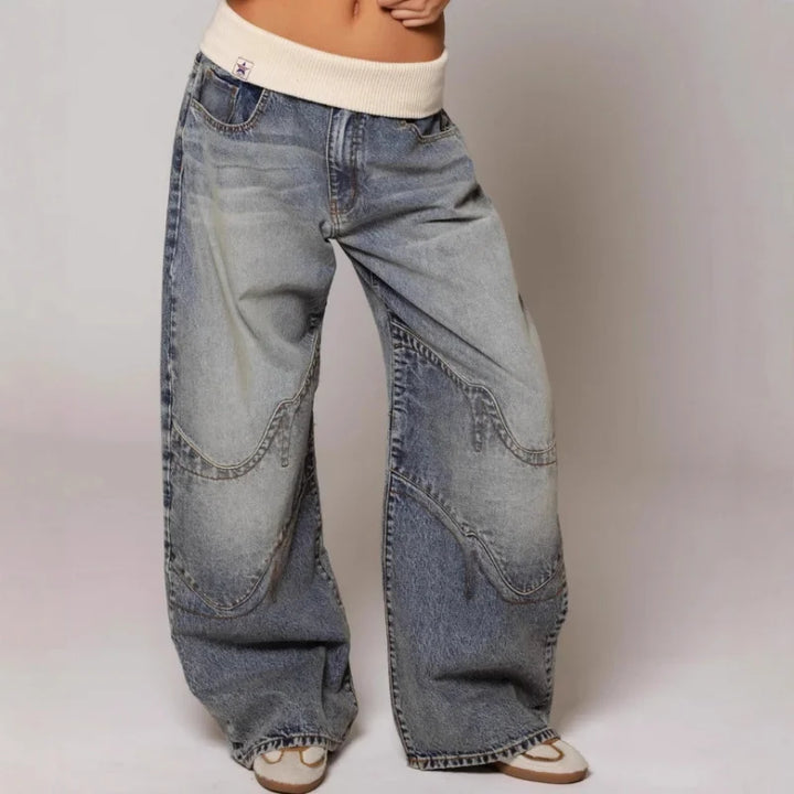 Stylish women's Y2K baggy wide leg jeans with a modern ribbed waist, ideal for a trendy oversized fit.