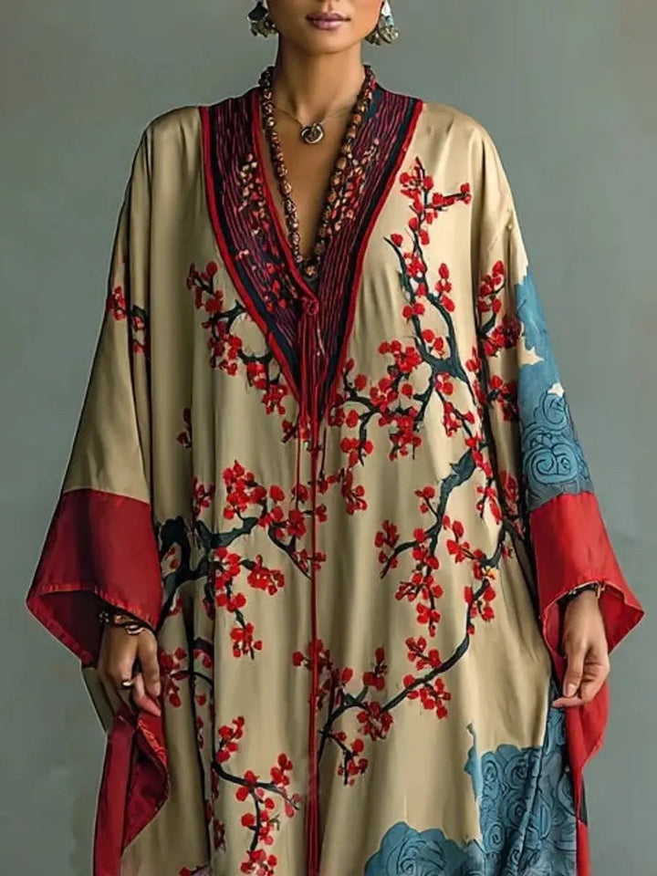 Kimono style floral batwing maxi dress for women. Elegant long sleeve design, versatile for autumn & winter fashion.