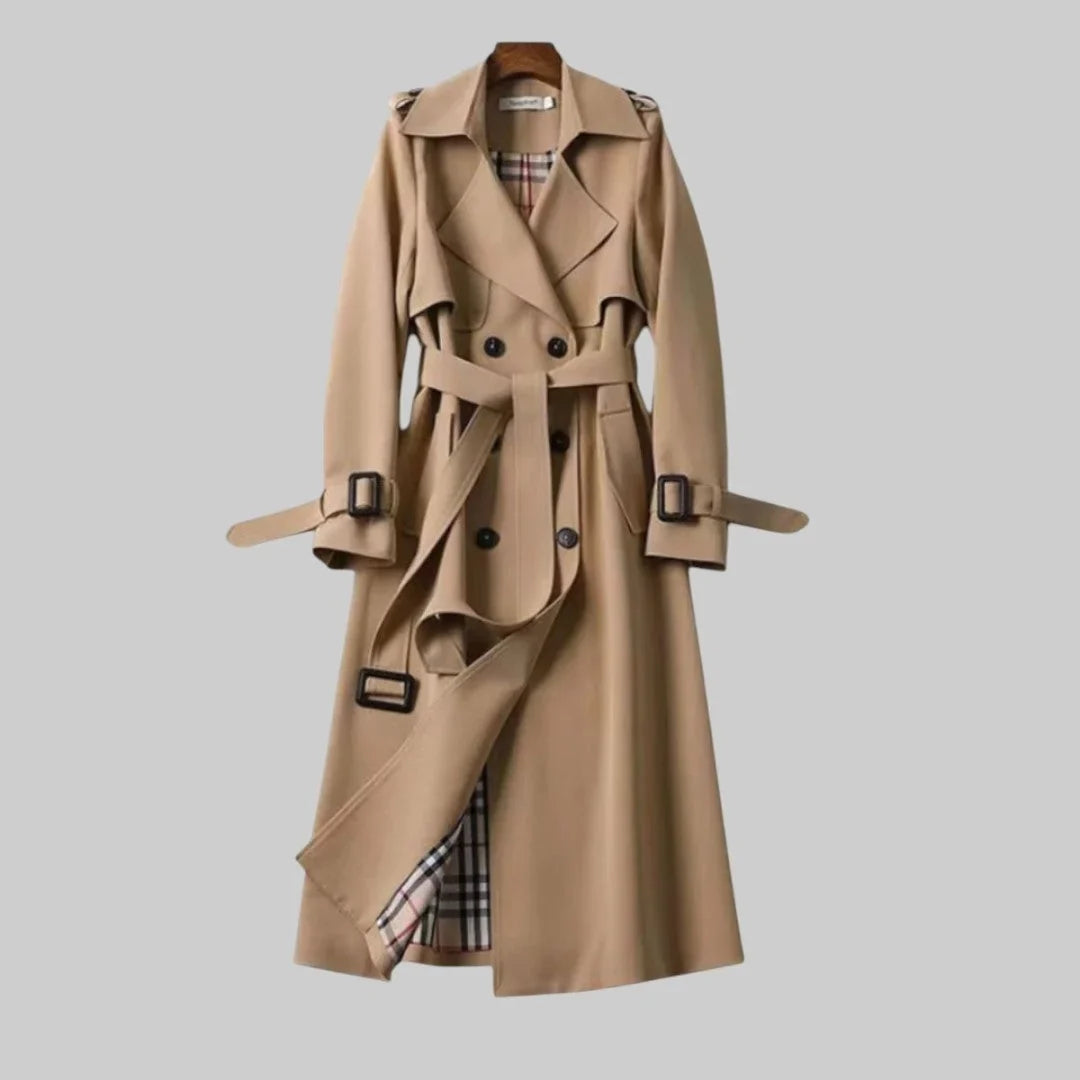Women's classic beige double-breasted trench coat with a stylish belted waist for elegant outerwear.