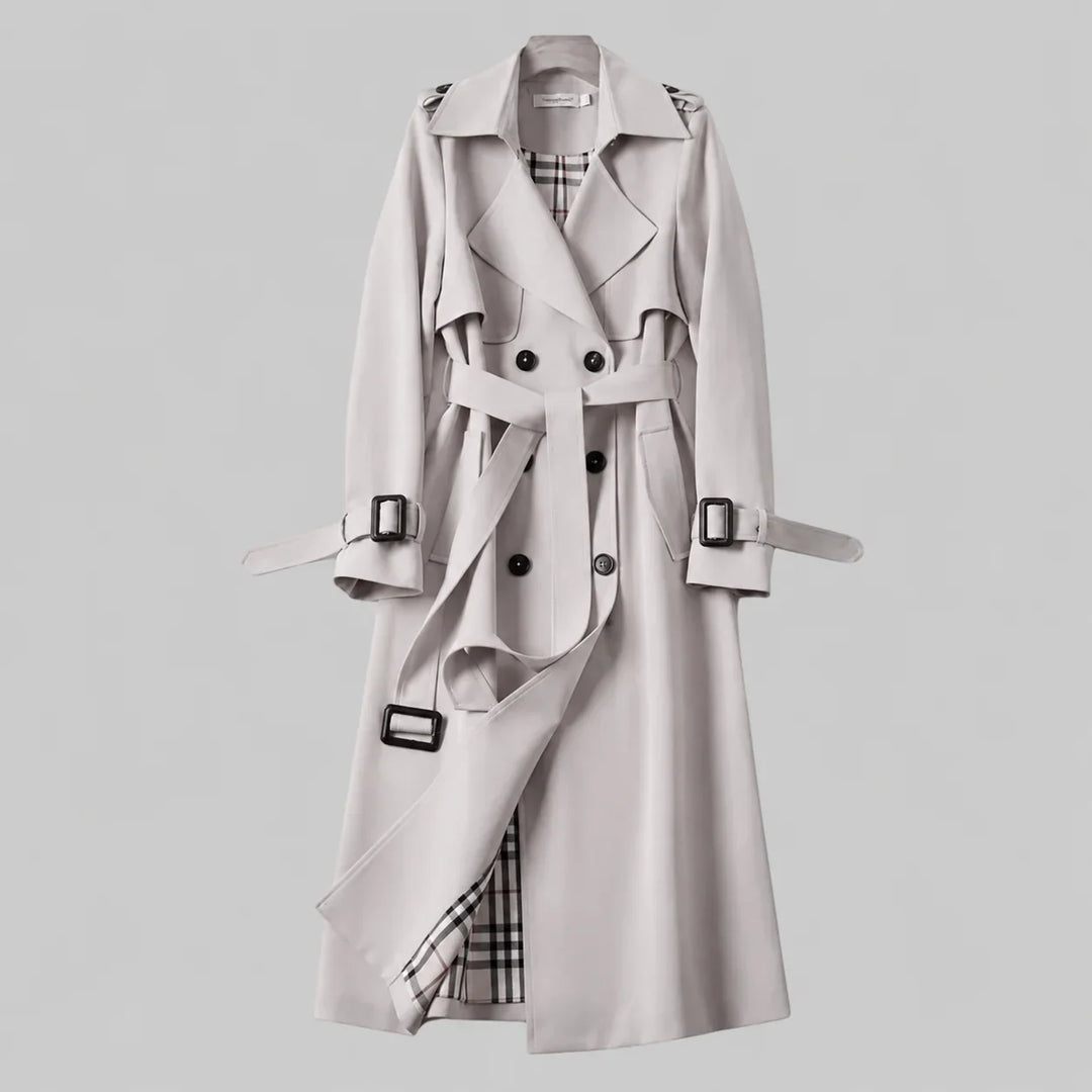 Sophisticated women's beige double-breasted trench coat with a belted waist and classic styling for fashion.