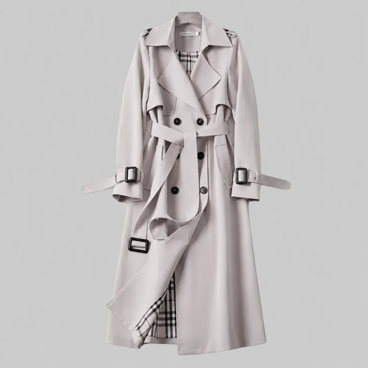 Sophisticated women's beige double-breasted trench coat with a belted waist and classic styling for fashion.