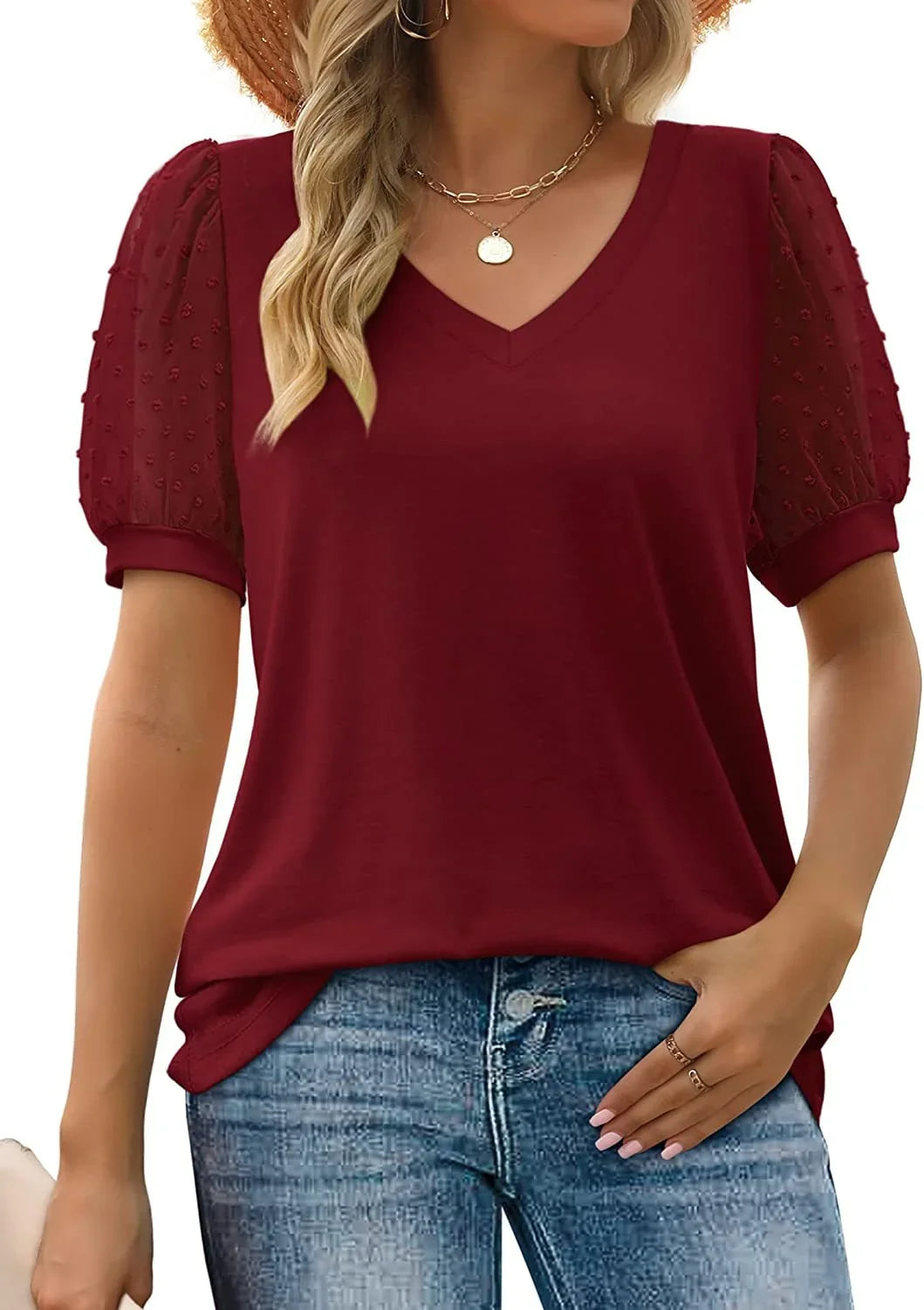 Classic black knit blouse for women, featuring a V-neck and stylish dotted puff sleeves. Perfect for officewear.