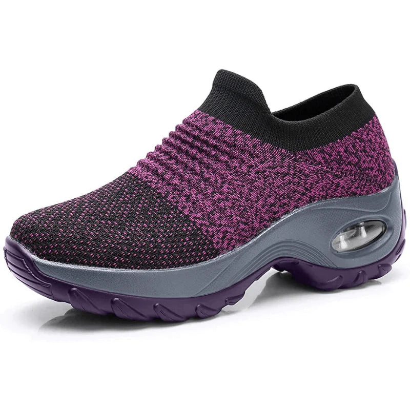 Black women's casual slip-on sneakers, lightweight and comfortable, featuring excellent arch support.