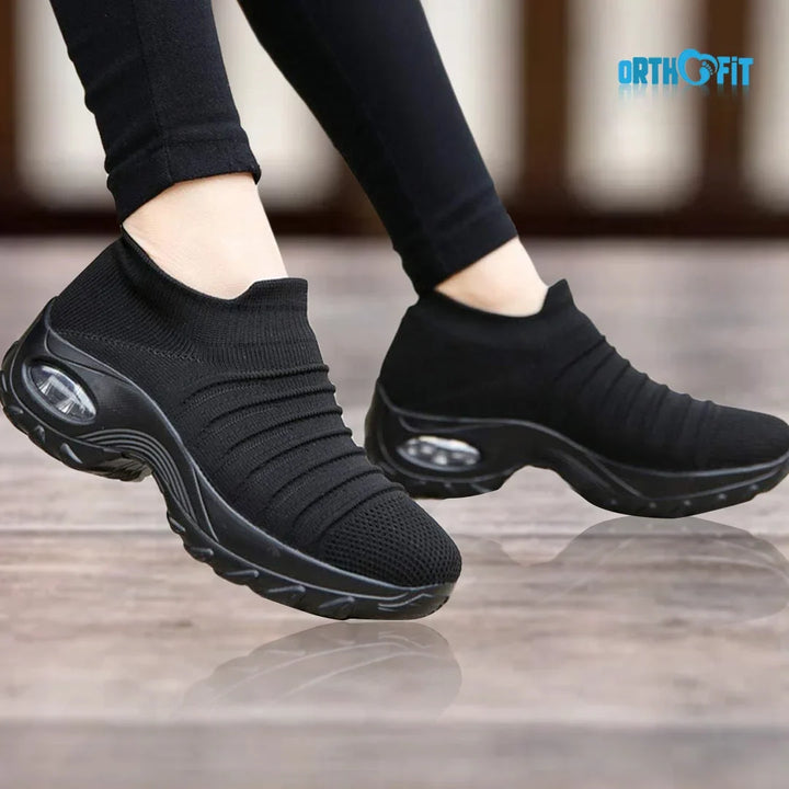 Women's slip-on sneakers with arch support and air cushion sole, perfect for walking and everyday wear.