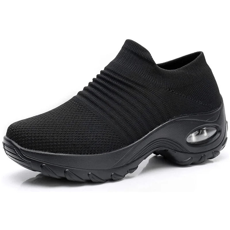 Lightweight women's casual slip-on sneakers, easy to wear, with supportive arch and cushioned sole.