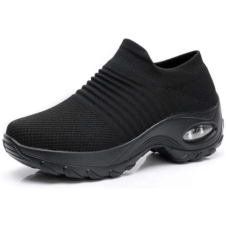 Lightweight women's casual slip-on sneakers, easy to wear, with supportive arch and cushioned sole.