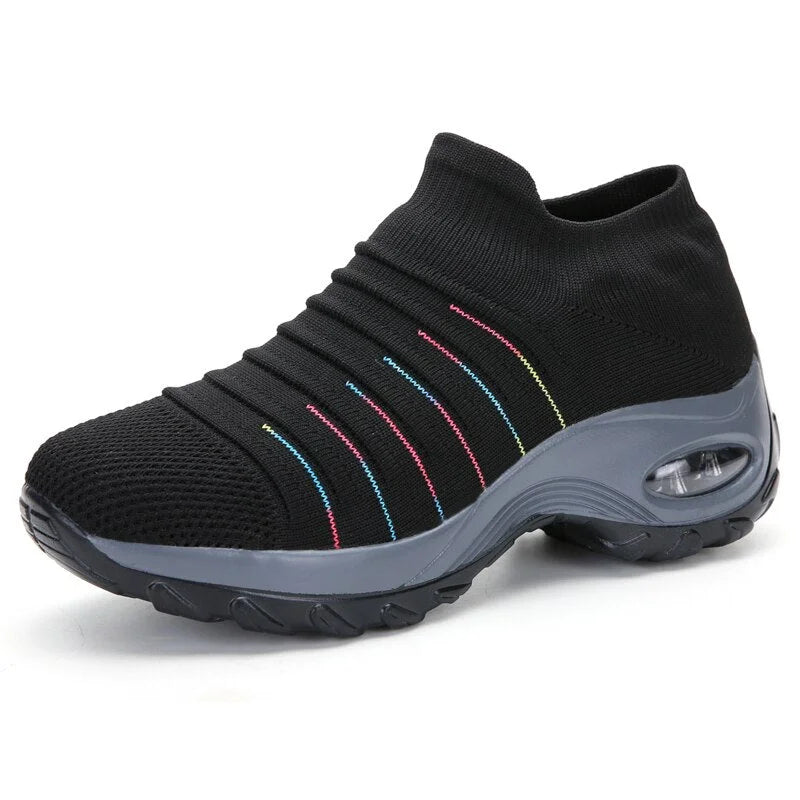 Stylish women's slip-on walking shoes with air cushion sole and arch support for active lifestyles.