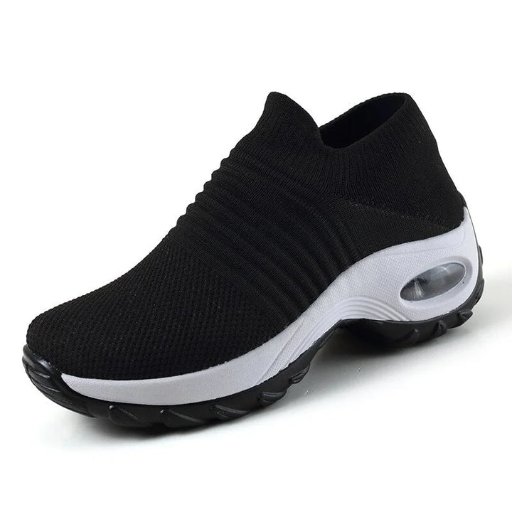 Everyday women's sneakers: slip-on, arch support, and cushioned air sole for ultimate comfort.