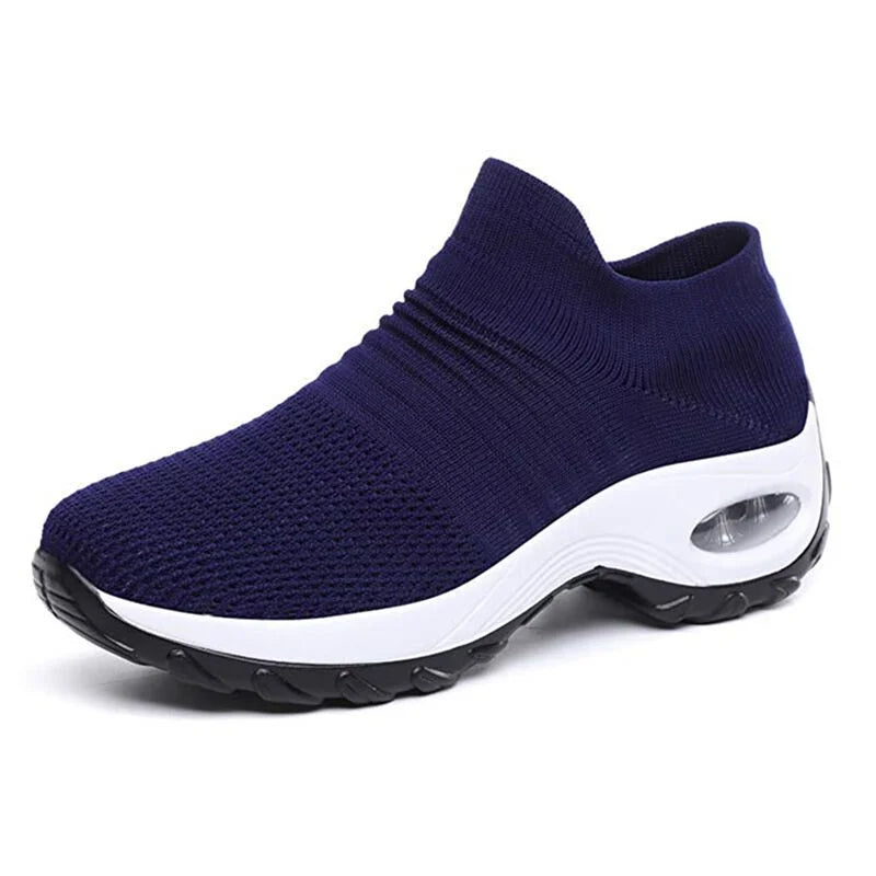 Cushioned women's slip-on sneakers, designed for all-day comfort with arch support and lightweight feel.