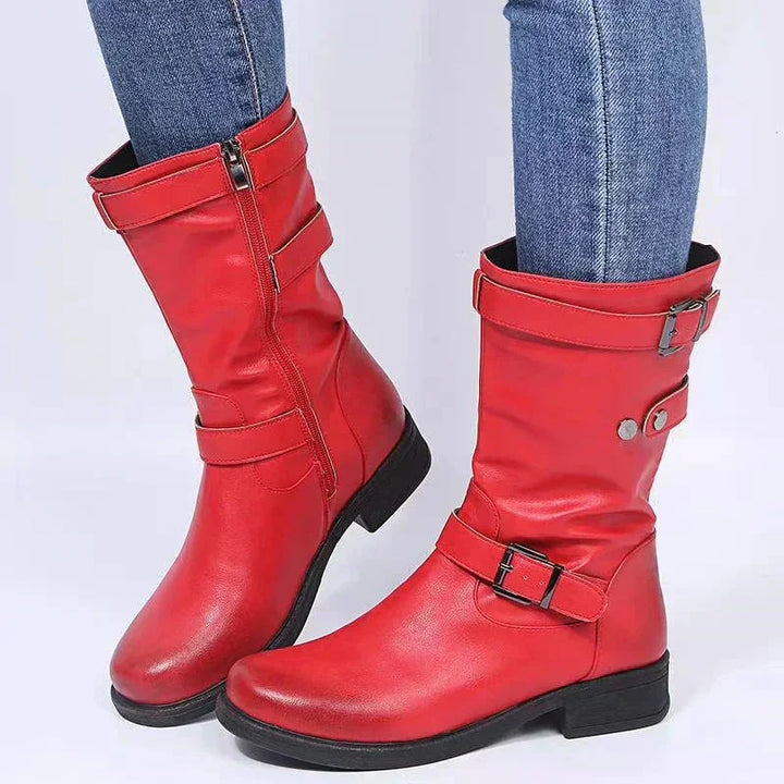 Comfortable black orthopedic mid-calf boots for women, offering excellent support & a chic biker style.
