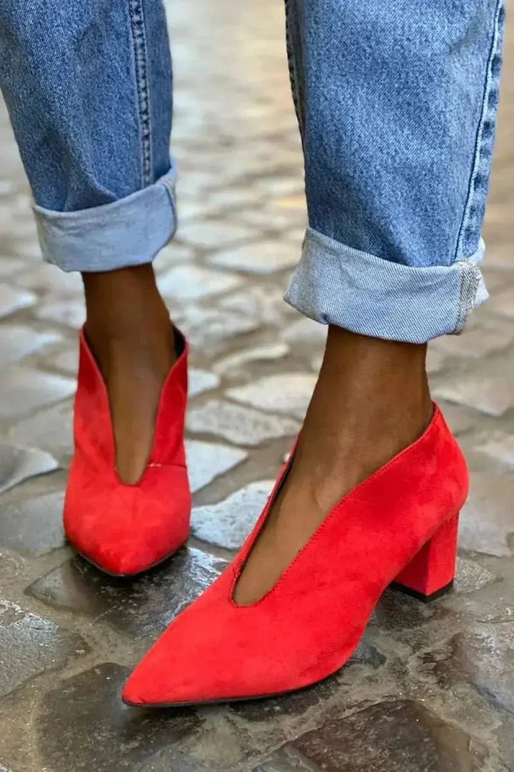 Stylish women's red block heel pumps, pointed toe & deep cut, for versatile office or evening wear, comfortable.