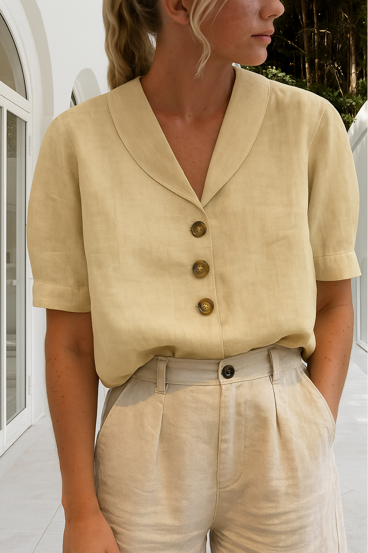 Versatile women's button-front blouse with a chic shawl collar. Ideal short sleeve shirt for casual or workwear.
