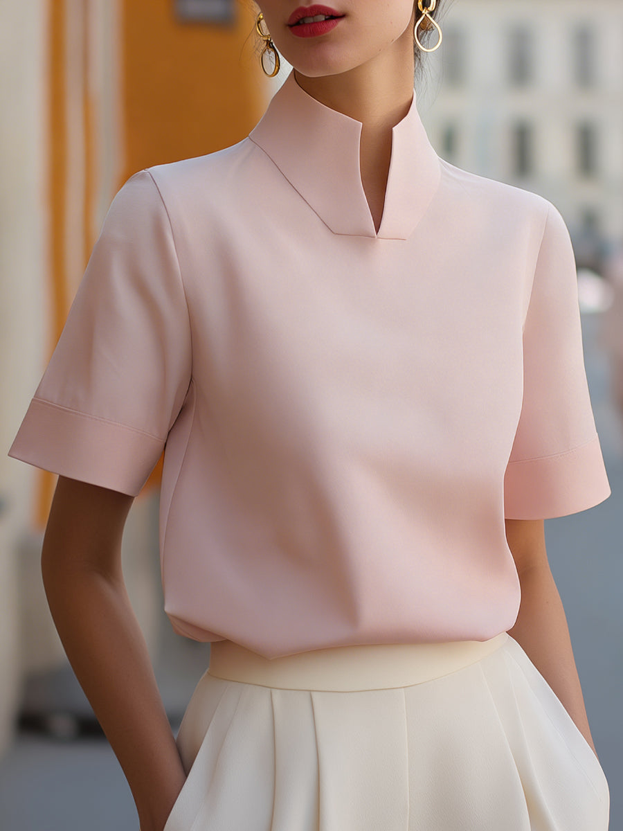 Elegant women's short sleeve blouse with stand collar, perfect for chic office wear or stylish everyday fashion.
