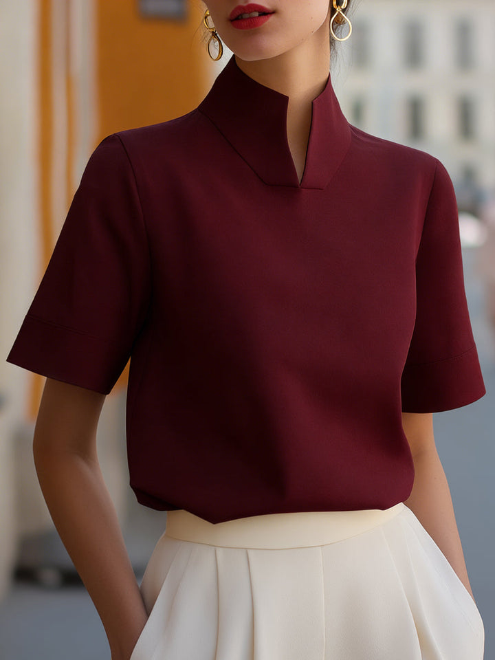 Summer-ready women's stand-collar short sleeve blouse. Relaxed fit, elegant, and comfortable for everyday or casual wear.