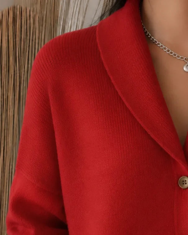 Stylish orange women's long sleeve collared knit cardigan sweater with a classic button-front design.