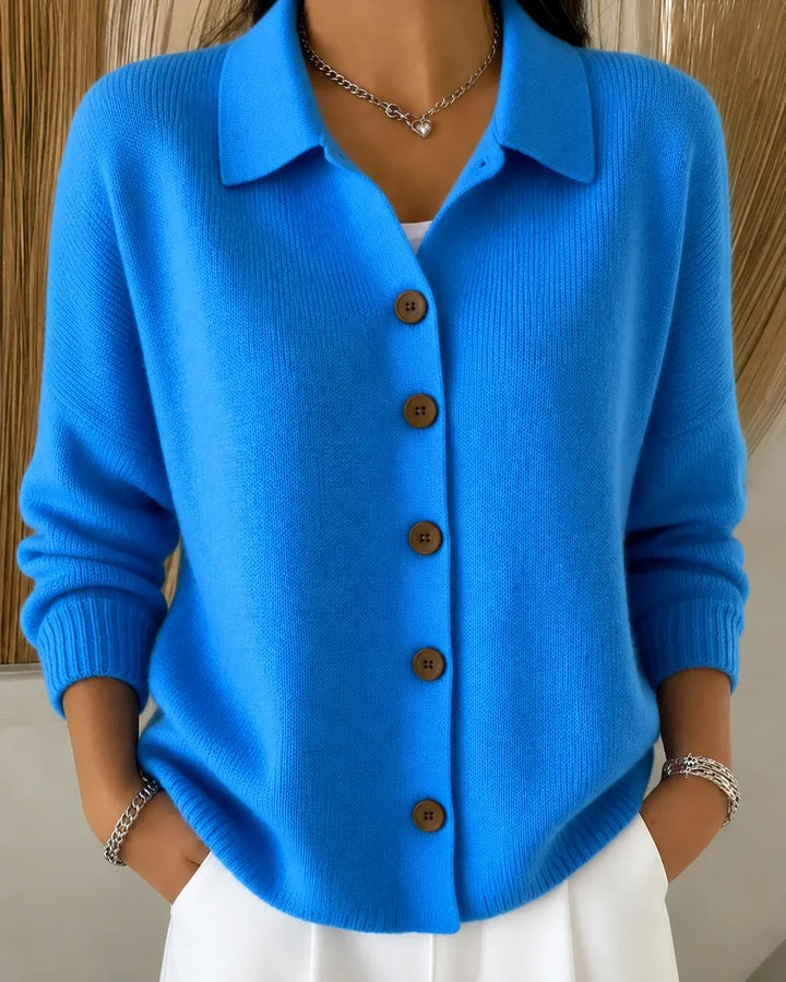 Women's collared knit cardigan sweater with long sleeves & button front for cozy layering.