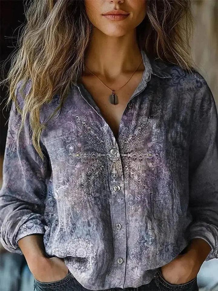 Striking floral & paisley print long sleeve boho blouse. Women's button-up top in earthy tones, versatile style.