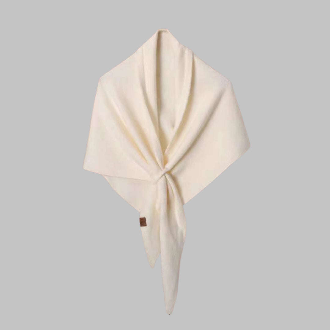 Bold striped women's triangle shawl, a versatile seasonal fashion accessory.