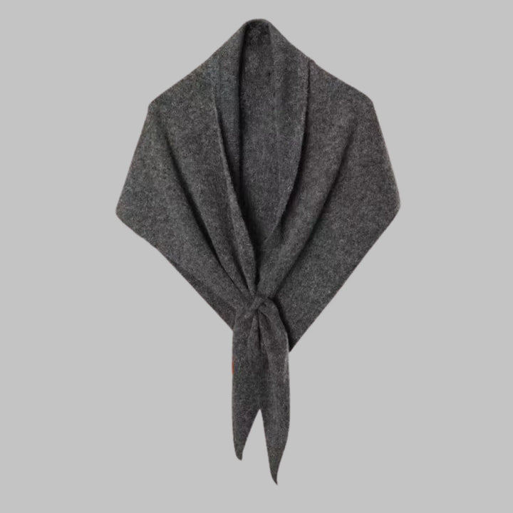 Comfortable women's striped triangle wrap, a chic and versatile layering accessory.