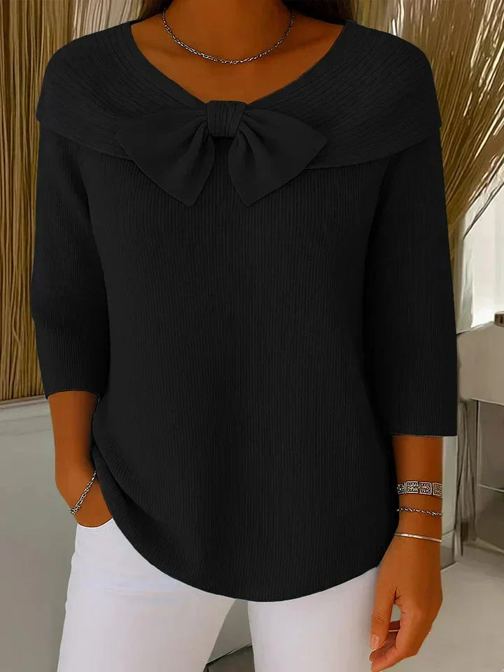 Black women's V-neck sweater with delicate bow detail on the neckline & stylish 3/4 sleeves. Versatile.