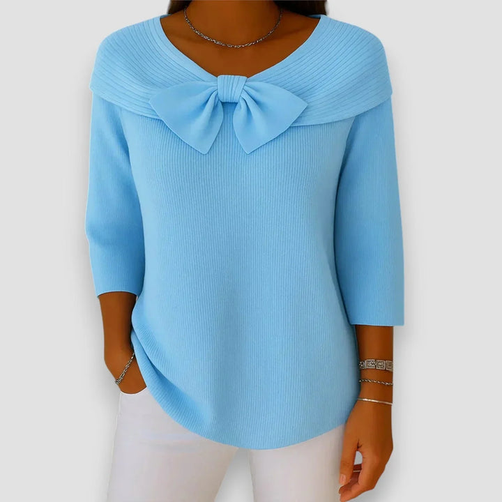 Light blue women's V-neck sweater with elegant bow detail & 3/4 sleeves. Feminine, comfortable casual wear.