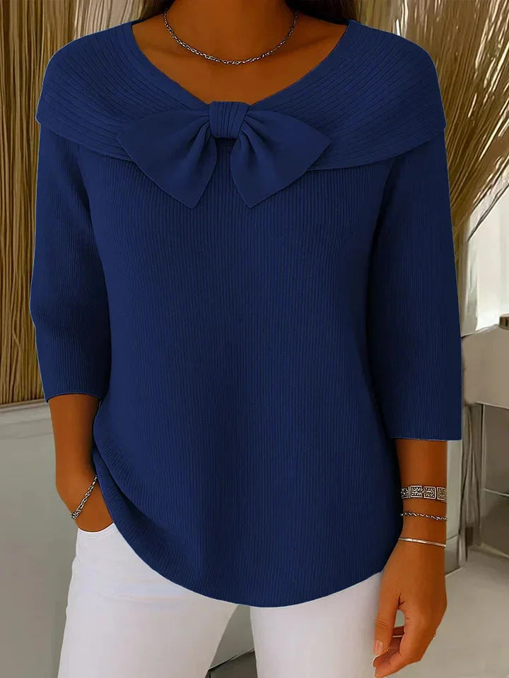 Dark blue women's elegant V-neck sweater, detailed with a front bow & comfortable 3/4 sleeves.