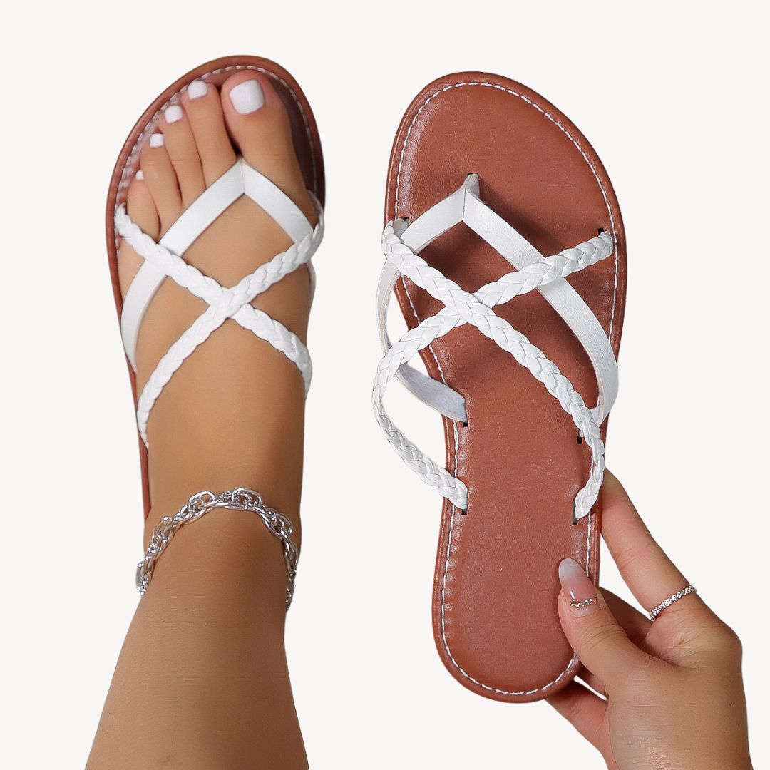 Women's braided orthopedic flat sandals with chic braided straps and ergonomic footbed, ideal for comfort and summer style.