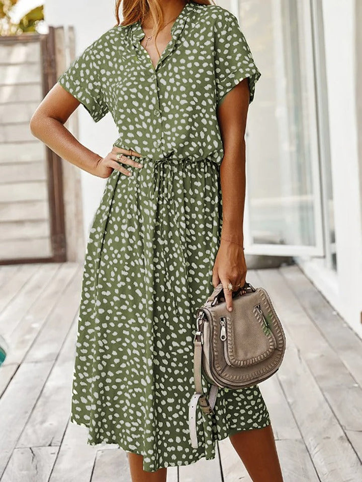 Women's breathable black midi dress, button front, relaxed fit with short sleeves, perfect for summer comfort and style.
