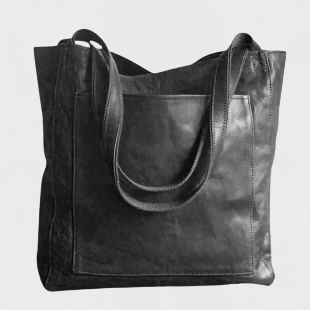 Coffee brown leather work tote bag for women, featuring a spacious interior and easy-access front pocket.