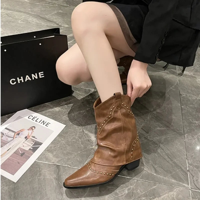 Pointed toe women's boots, studded western mid-calf style, edgy and bold.