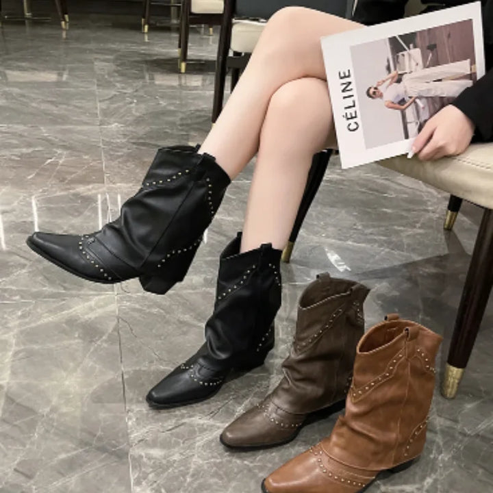 Women's studded mid-calf boots, western style, pointed toe, perfect for a chic outfit.
