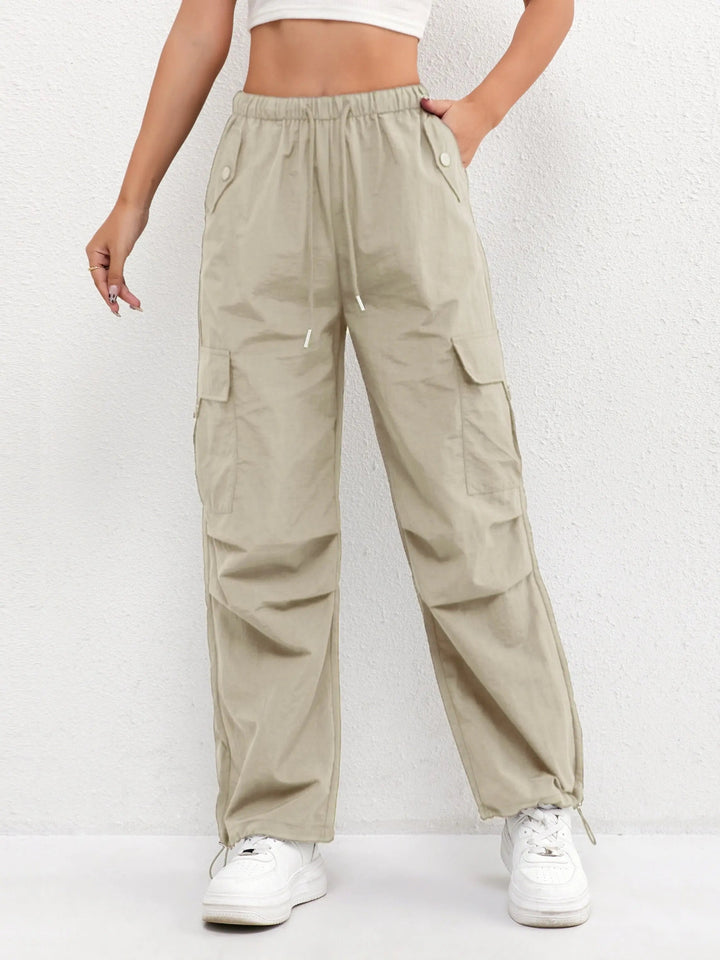 Back view of women's everyday fashion parachute cargo pants, comfortable fit with practical rear pocket details.