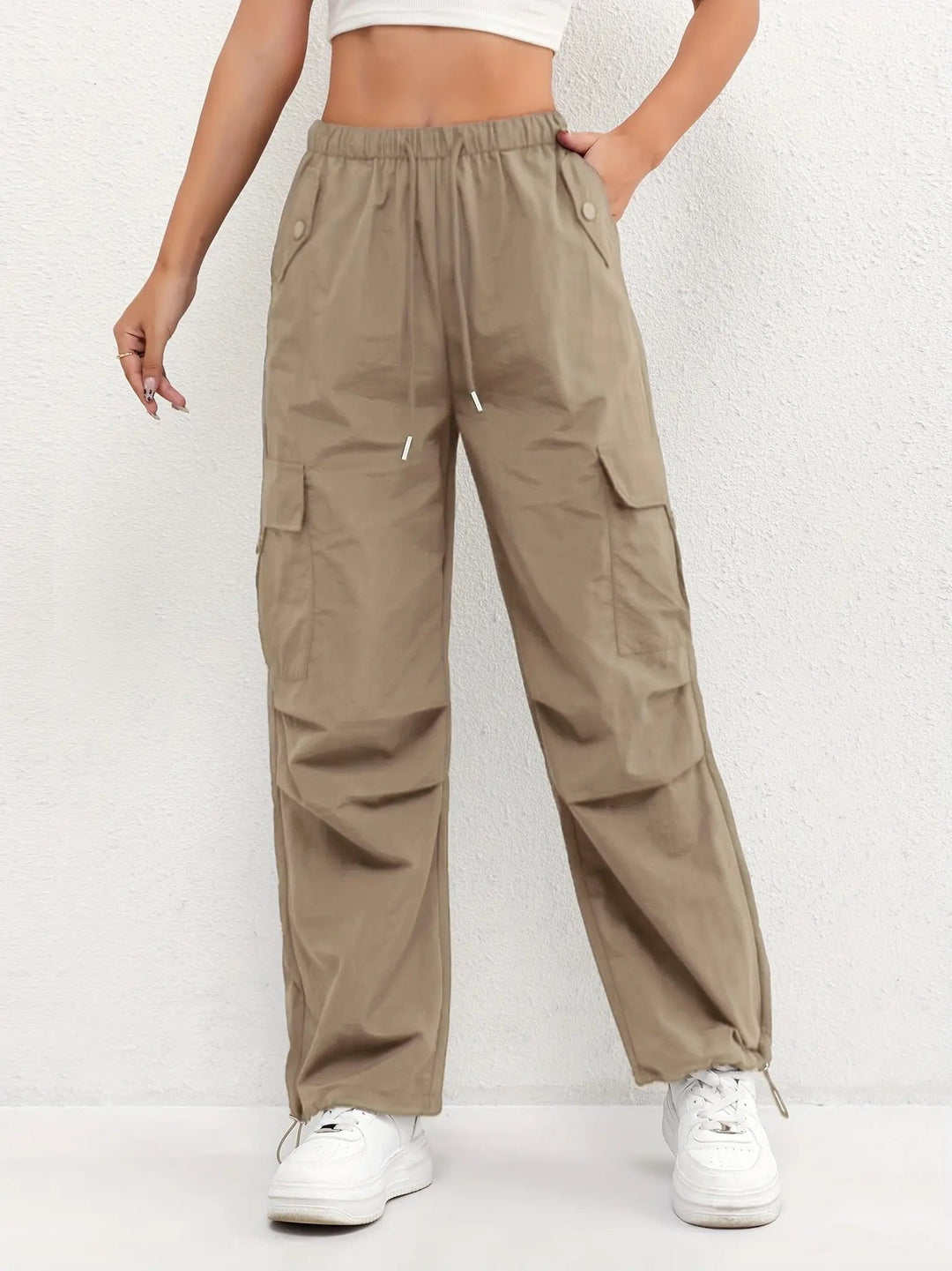Stylish women's parachute cargo pants with adjustable waist & utility pockets, perfect for versatile casual outfits.