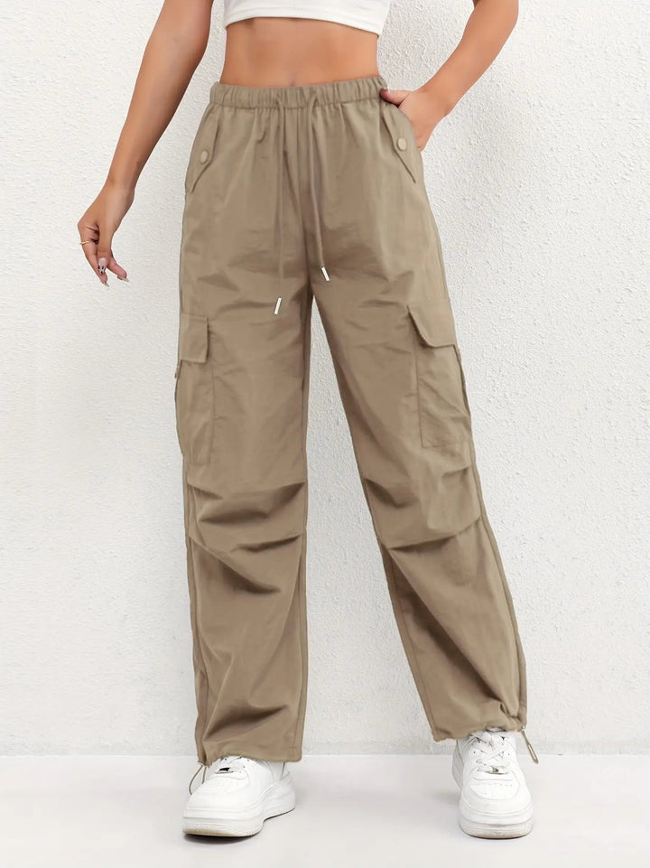 Stylish women's parachute cargo pants with adjustable waist & utility pockets, perfect for versatile casual outfits.