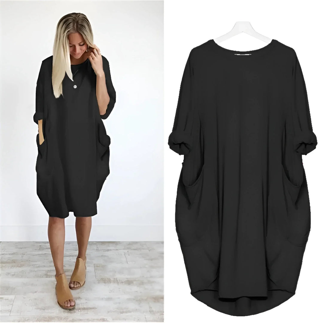 Women's casual oversized midi dress with comfy 3/4 sleeves & practical pockets.