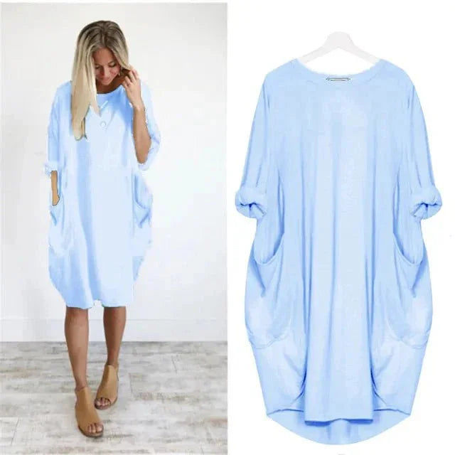 Loose-fit women's midi dress, oversized and flowy, with comfortable 3/4 sleeves & handy side pockets.