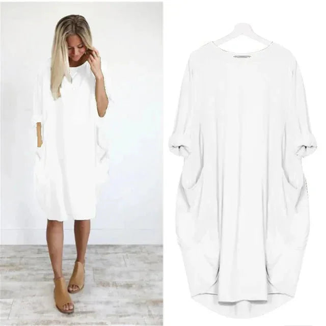 Versatile women's casual midi dress, oversized for comfort, 3/4 sleeves, & essential pockets.