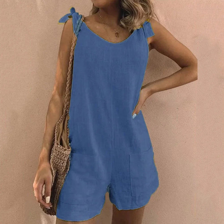 Lightweight women's short jumpsuit with cute bow straps, perfect for a breezy and comfortable summer fashion.
