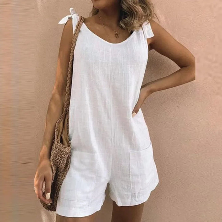 Women's casual short jumpsuit with stylish bow straps & practical patch pockets, perfect for summer daily wear.